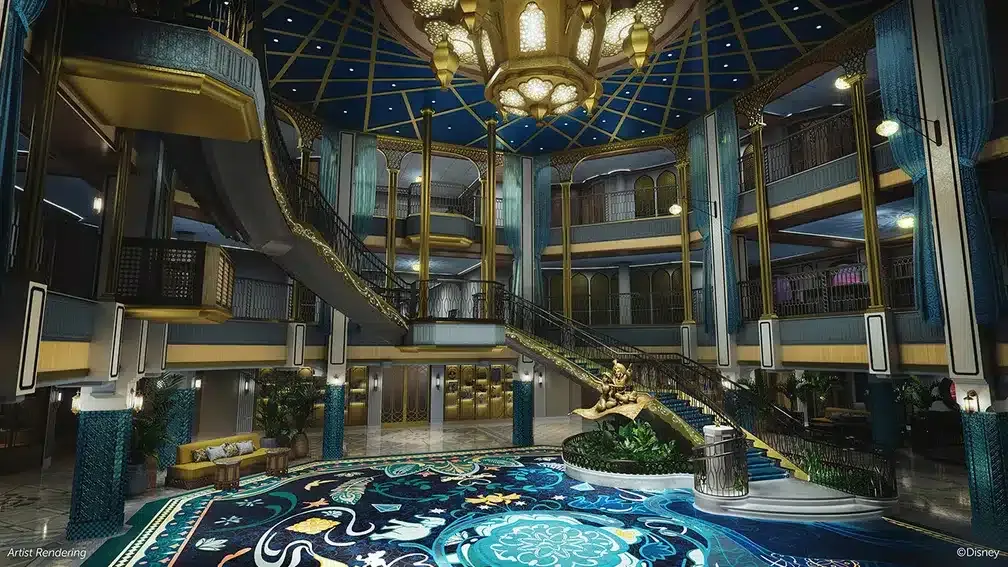 a large room with a circular staircase and a blue carpet