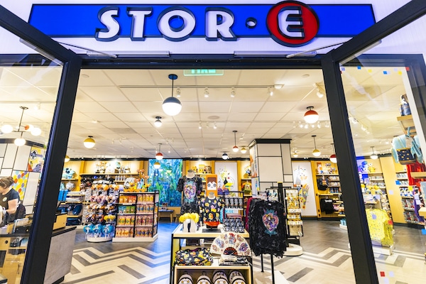 a store front with a sign and a storefront