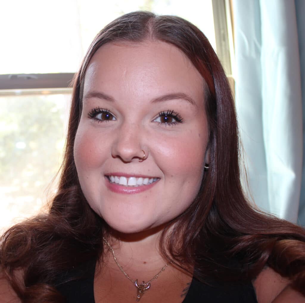 a woman smiling at camera